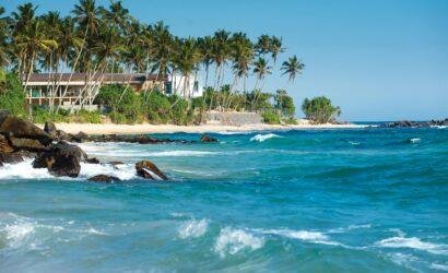 Bentota Beach with golden sand and turquoise waters, Sri Lanka