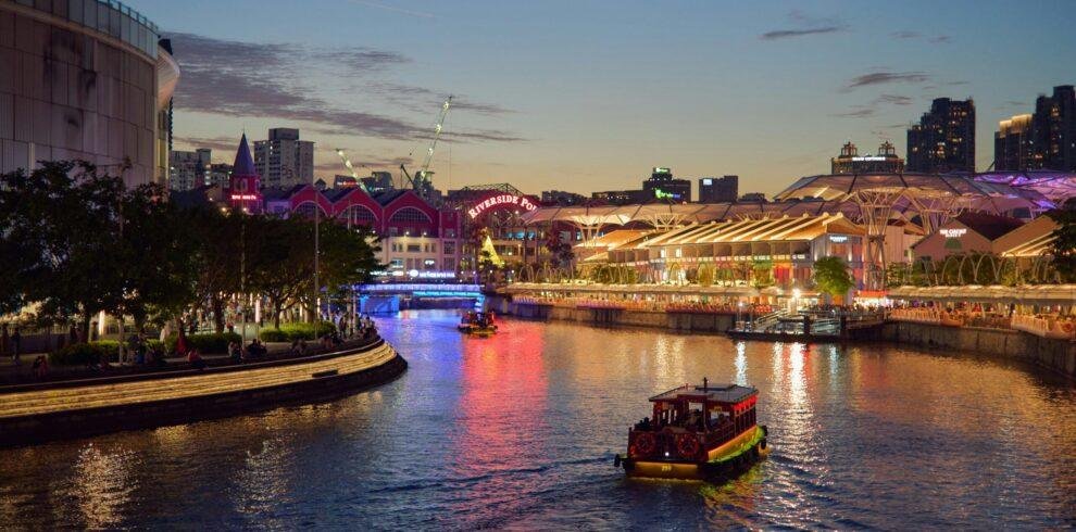 Genting Dream luxury cruise ship docked at Singapore port on a cruise tour