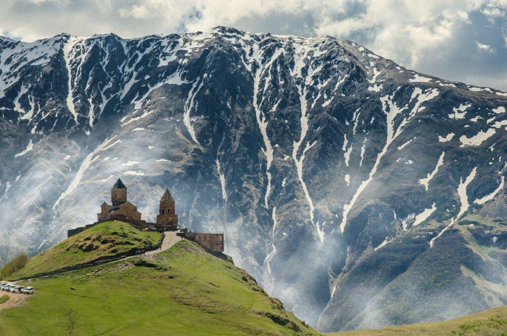 Snow-capped Gudauri mountains and alpine ski slopes in the Greater Caucasus range, Georgia