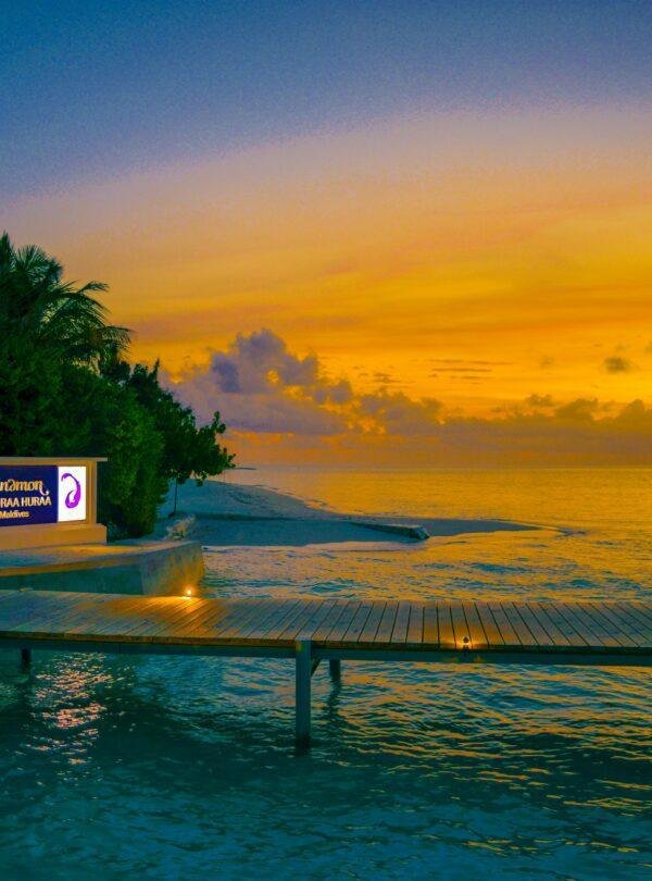Aerial view of Maldives islands with turquoise waters and coral reefs