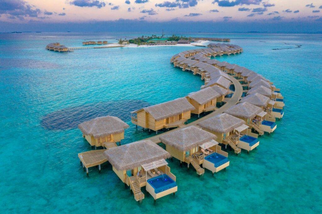 Maldives overwater villa with private pool and panoramic ocean view